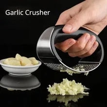 https://bismamart.pk/cdn/shop/products/Stainless-Steel-Garlic-Press-Manual-Garlic-Masher-Tool-Chopping-Garlic-Tool-Vegetable-Garlic-Crusher-Kitchen-Accessories_jpg_220x220xz_jpg.jpg?v=1701529642